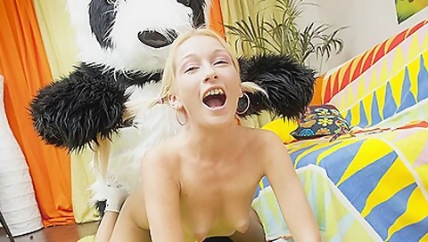 Sexy girl having fun with her panda bear